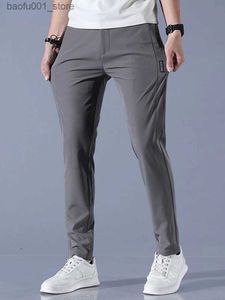 Mäns byxor Mens 2024 Summer Silk Casual Pants Mens rakt Löst elastisk tunn snabb torkning av ungdomssporter andningsbara byxor Q240529