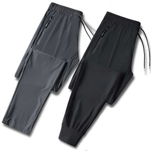 Zupełnie nowy projektant Ice Silk cienki, swobodny szybki suszenie lato na prostą nogę luźne spodnie sportowe