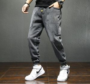 Jeans de harém de tamanho positivo calças jeans esticadas de streetwear preto joggers homens casuais calças folgadas3541569