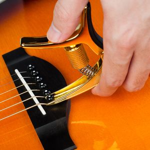 Guitto GGC-02 Gitar CAPO ZINCS ALIME TUMING Kelepçesi Akustik Elektro Gitar ukulele Mandolin Banjo Gitar Parçaları Aksesuarları