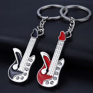 1PCS Mini Metal Metal Classic Electric Kichain Chain Chain Guitar Ring Instruments Musical Instruments Pinging for Man Women