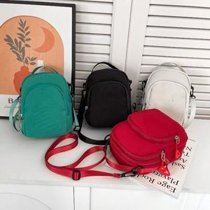 女性用の旅行バッグ男性キャンバス高品質の屋外ランニングショルダーバッグダブルジッパー財布電話バッグ