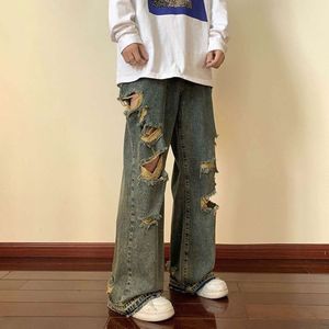 Raggade kant jeans med hål och trendiga Instagram high street Men's American Style raka ben tiggarbyxor