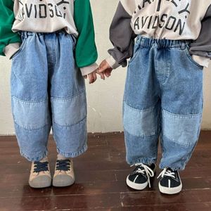 Jesienne chłopcy i dziewczęta Patch mody dżinsy unisex dzieci luźne casual dżinsowe spodnie L2405