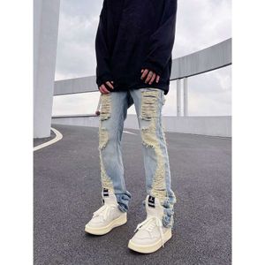 Jeans American High Instagram Men's Hiphop Explosive Street skadade staplade mikro rasande byxor för män och kvinnor
