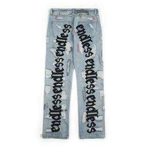 2024 Niekończące się mężczyźni dżinsy Wysokiej jakości hip hop dżinsowe spodnie haftowe złamane do starej hole streetwear r9zt