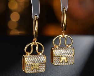 Designers de marca de luxo Hem 18k Brincos de ouro de alta qualidade Brincos clássicos 925 prata pregos de bolsa de pingente de pendente Mulheres Brincos de festa de festas de casamento Presente de joias