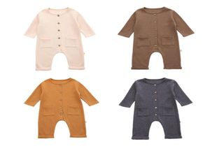 Bomull långärmad knapp onesie baby rompers autum unisex nyfödda babykläder fast färg spädbarn kläder 336m3566622