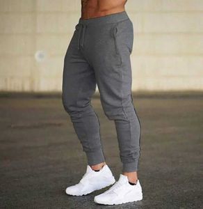 Calças masculinas 2024 Moda Men Ginássas Pantas de cor pura Joggers Fitness Casual Pants Long Men Workout Skinny Sweetpants TROURSIS ARTILHAS DE RECURSO S2452411