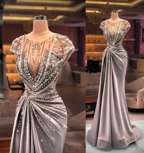 2021 Arabskie seksowne luksusowe sukienki na studniówkę klejnot szyi iluzja rękawy kryształowe cekiny Bling Formalne sukienka imprezowa Suknia wieczorna 1810646