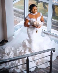 2024 Luxury African Wedding Dress O-neck Crystal Beads Long Sleeves Illusion Ruffles Train Plus Size Mermaid Bridal Gown Vestidos De Novia Custom Made