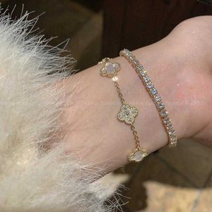 Vans Nuovo braccialetto in stile cinese Bracciale con trifoglio pieno di diamanti Fiore di lusso Luce di lusso Flash Diamond 2023 Nuovo braccialetto artigianale