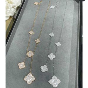 Hot High version Van four leaf clover six flower full diamond necklace for womens able temperament small tassel pendant collarbone