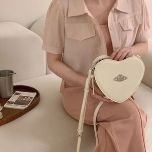 Hjärtformväska crossbody handväska för kvinnor älskar väska zip runt axelväska fast färghandväska för flicka