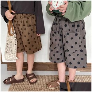 Shorts barn kläder barn casual byxor 2024 vår och sommar polka dot baby pojkar flickor förlorar koreansk stil droppleverans moderskap otoww