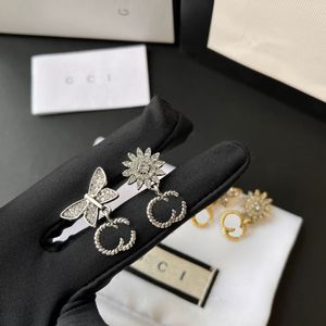 Luksusowe złote i srebrne kolczyki projektant marki wiosenne nowe modne kolczyki wysokiej jakości biżuteria diamentowa inkrustowana romantycznymi prezentami miłosnymi imprezą