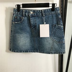 Saias irregulares de jeans de bolso feminino