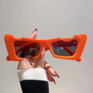 Solglasögon kammpt oregelbundna kattögon solglasögon för kvinnor 2023 Fashion Special Notch Candy Colored Glasses Brand Design UV400 Shadow Protection J240330