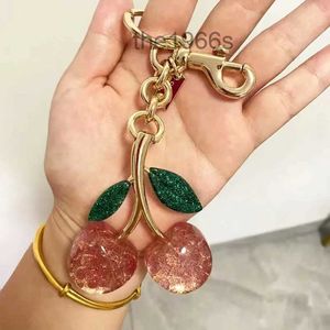 Kluczowe pierścienie Coa ch Cherry Bierek Bag w torbie Dekoracja Akcesorium Różowe zielone wysokiej jakości luksusowy projekt 231218 2MJ8