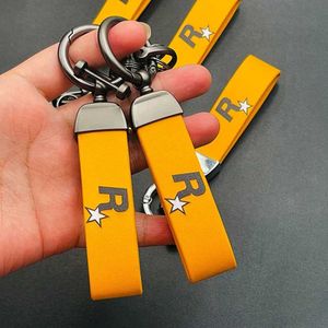 Keychains Lanyards Yellow Multi Pendant Keyholder Hållbar nyckel med nylonband Keychain Game GTA Automatic 5 KeyChain Fan Keyring J240330