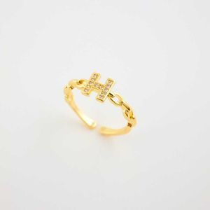 Hochwertiger, luxuriöser, minimalistischer Hremms-Edelstahl-Buchstabe H aus 18 Karat Gold mit Diamant und offenem Zirkon mit Logo