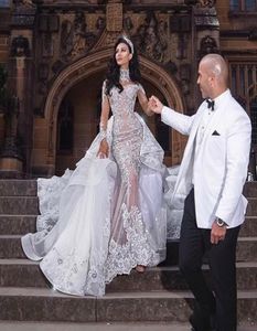 2020 Luxurious Rhinestone Crystal Wedding Dresses High Neck Beads Applique Long Sleeves Mermaid Bridal Dress Dubai Wedding Gown Ov6008468