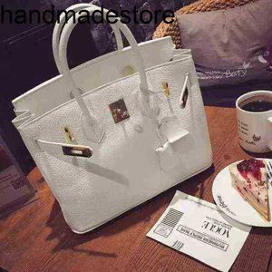 Läder BK Handväska Designer 2024 Spring and Summer Korean Fashion Cream White Lychee Mönster Platinum Bag Celebrity Lady Buckle