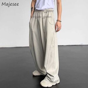 Mens Calças Casuais Homens Verão Baggy Moda All-Match Cool High Street Hip Hop Calças Americano Elegante Ins Adolescentes Europeu BF 230316