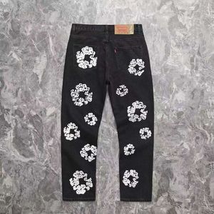 American Hip-Hop High Street Umyjane i mielone białe dżinsy Trendy Street Kapok wydrukowane dżinsy i spodnie