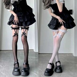 Meias sexy de especiarias sexy fishnet jk lolita meias meias de estilo japonês suspensórios de arco de renda finos primavera verão preto e branco y240401