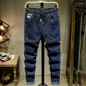 Mäns jeans vår 2024 plus size mörkblå dragskon design stretch denim byxor man varumärke 5xl 6xl 7xl 8xl 9xl 10xl