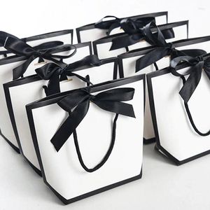 Confezione regalo 10 pezzi/lotto fiocco di nastro sacchetto di carta bianca borse di tela shopping festa matrimonio compleanno vendita al dettaglio
