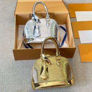 24ss Designer di lusso femminile Nuovo borsa per piccole gusci d'oro Borsetta da donna Borsa da donna Borsa a tracota da tracolla piccola e delicata 16 cm