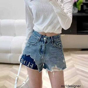 Designer Shenzhen Nanyou High Edition Summer New CE Home High midje nagelpärla genombrott Denim shorts kvinnors pälskontrast färg heta byxor gyup