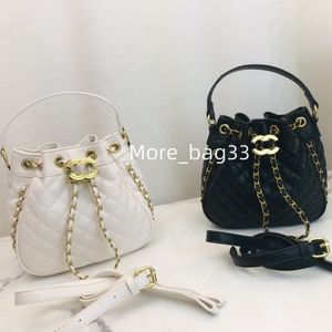 2024 Ny handväska Luxury Chain Bag Gold Ball Designer Väskor Kvinnor Hink Bag Crossbody Väskor Designer axelväska mini svart koppling