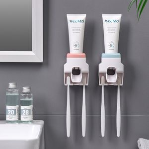 トイレの歯磨き粉ディスペンサー自動壁に取り付けられたペースト歯磨き粉ディスペンサーバスルームアクセサリー自動押出機