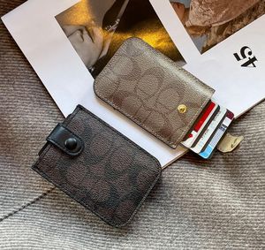 Kvinnors korthållare plånböcker Key Coin Purse Brown Flower Poke Keychain äkta läder Luxury Mens Designer Wallet Coin Purses Key Pouch Cardholder