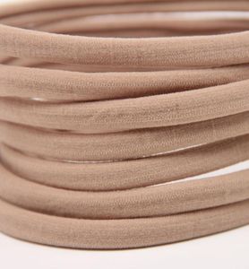 12 färger tillgängliga babyflickor nylon pannband tan naken naken nylon hårband baby hårbandnylon elastiska pannband bulksoft tunt sup5232581