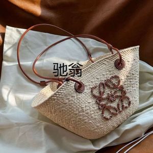 Contact and distribute the French style Luo family grass girls. New 2023 vacation high-capacity woven tote bag for women