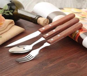 18 pezzi set di posate con manico in legno acciaio inossidabile creativo giapponese stoviglie coltello da bistecca forchetta cucchiaio stoviglie da cucina Giappone X0702165864