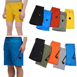 designer shorts mens shorts högkvalitativ designer enkel linsficka kort avslappnad färgade strand shorts simning shorts utomhus jogging casual snabbtorkning cp kort