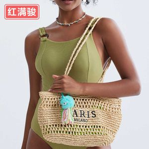 Novo bolsa de ombro de grama tecida nova, bolsa oca de bolsa de verão feminina de verão 240402