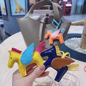 Keychains Lanyards Wholesale Hem Luxury PU Leather Angel Wings Horse Shape Keychain Pendant for Ladies Mini Pony Rodeo Bag Charm Accessories Ornament T231225