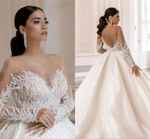 Glitter Beaded Sequin Ball Gown Wedding Dresses Long Sleeves Open Back Dark Ivory Satin Long Bridal Gowns Illusion Crew Neck Sexy Luxury Bride Dress