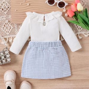 Set di abbigliamento Abiti autunnali per bambina Colletto per bambola in maglia a costine Pagliaccetti a maniche lunghe Bottoni Gonne scozzesi Set di vestiti da 2 pezzi