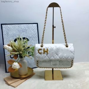 O designer de bolsa de couro vende bolsas femininas de marca a 50% de bolsa de desconto feminino moda moda bordada rômbica versátil nova cadeia de ombro único quadrado pequeno