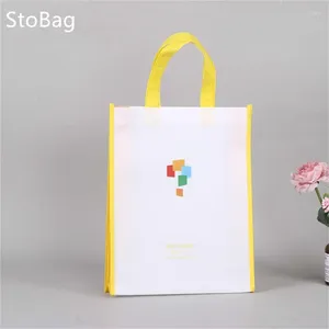 Envoltório de presente StoBag Impressão em cores em branco Saco não tecido À prova d 'água Embalagem Roupas Doces Brinquedo Livro Sapatos para Escola Suppily Kids Party Decor