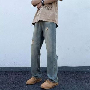 High Street nödställda jeans för mäns koreanska version Trendiga Ruffian och stilig stjärna 2023 New Autumn Ins Distressed Pants