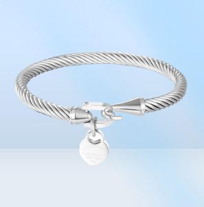 Braccialetti dal design classico con gancio Polsini con ciondolo a forma di cuore di pesca per le donne Gioielli con cavo in acciaio inossidabile Amore Pulsera Gift3292629