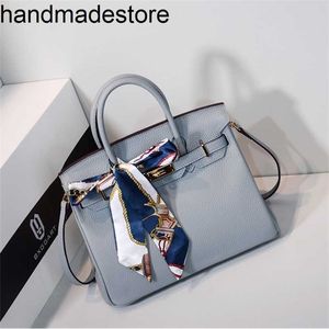 Bk Platinum Leather Designer Handbag Womens Bag 2024 New Tide Litchi Pattern Head Bag Tsingle Shoulder Messenger Bag